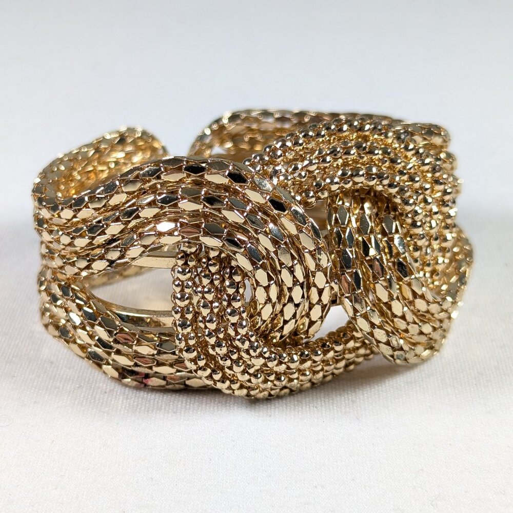 1980s chunky gold tone hinged metal mesh knot cuff bracelet